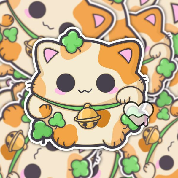 A graphic of Calico Shamrock Lucky Cat Sticker available on HeckinMagical.com