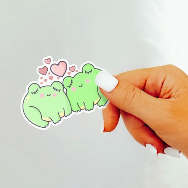 A graphic of Froggy Love Sticker available on HeckinMagical.com