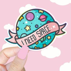 A graphic of I Need Space Sticker available on HeckinMagical.com