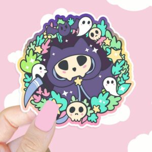 A graphic of Kitty Reaper Sticker available on HeckinMagical.com