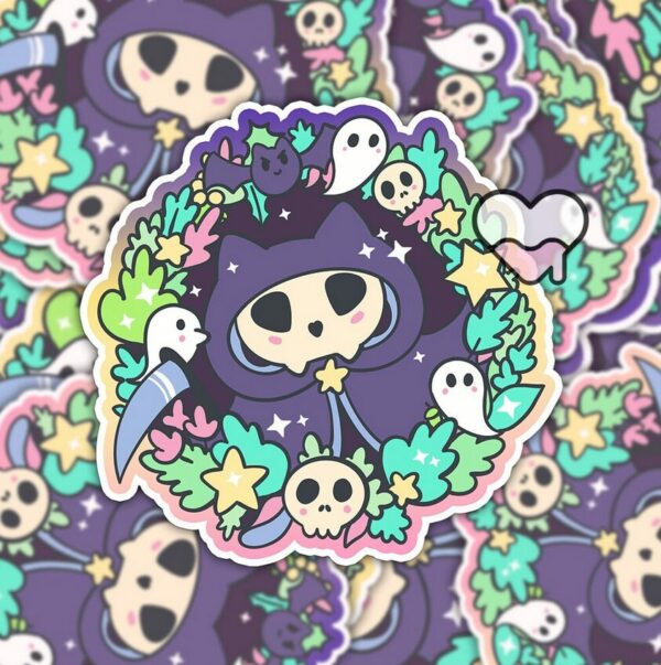 A graphic of Kitty Reaper Sticker available on HeckinMagical.com