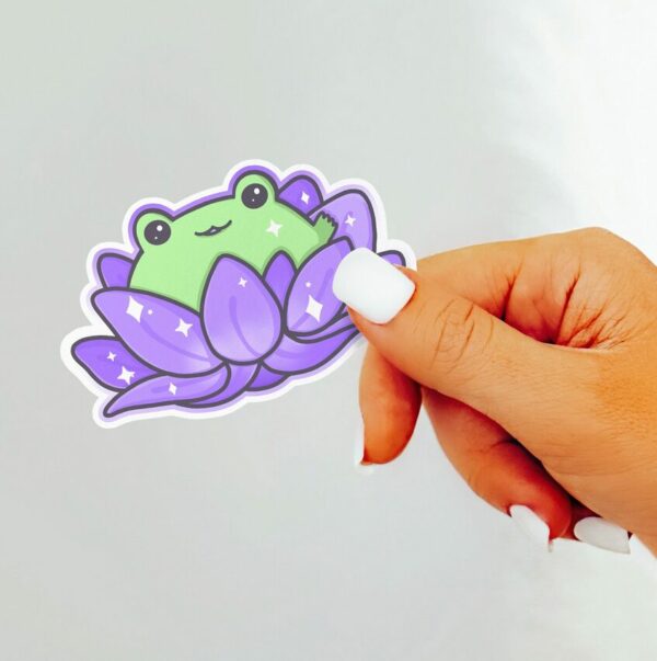 A graphic of Lotus Frog Purple Sticker available on HeckinMagical.com