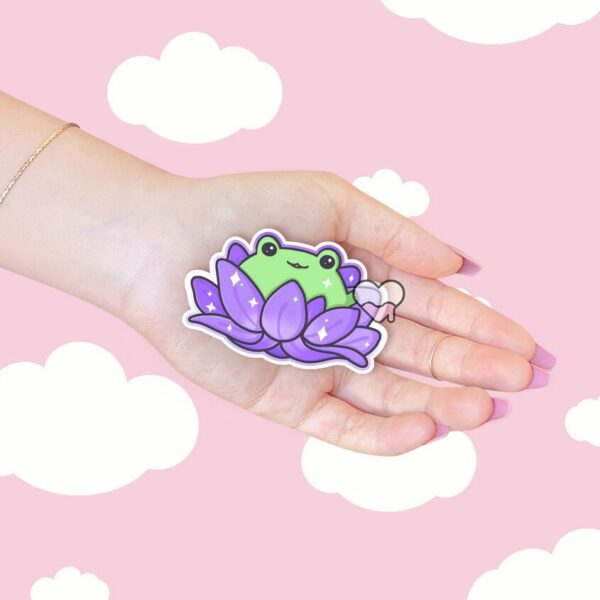 A graphic of Lotus Frog Purple Sticker available on HeckinMagical.com