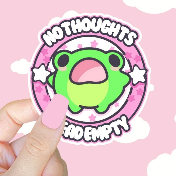 A graphic of No Thoughts Head Empty Frog Sticker available on HeckinMagical.com