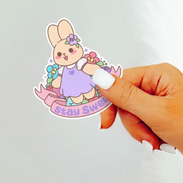 A graphic of Stay Sweet Lavender The Bunny Sticker available on HeckinMagical.com