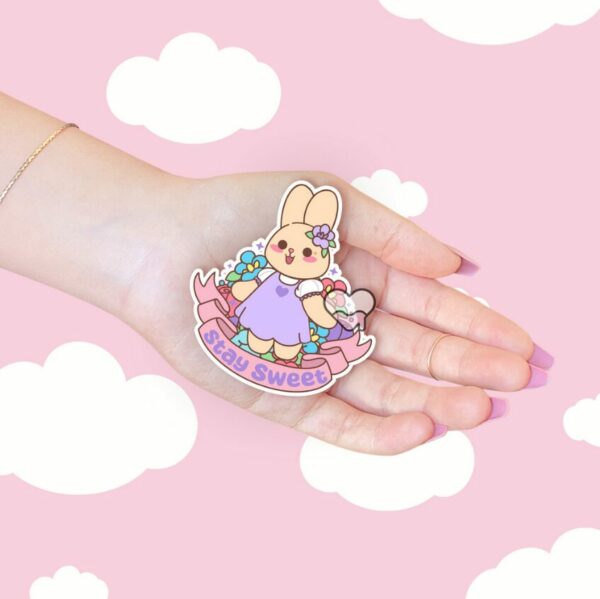 A graphic of Stay Sweet Lavender The Bunny Sticker available on HeckinMagical.com