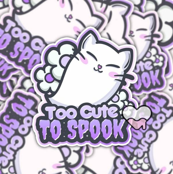 A graphic of Too Cute To Spook Cat Ghost Sticker available on HeckinMagical.com