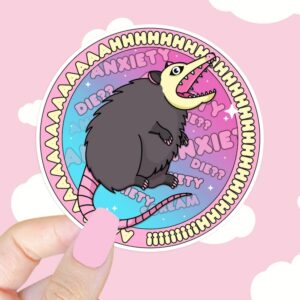 A graphic of Ahhh Anxiety Possum Round Sticker available on HeckinMagical.com