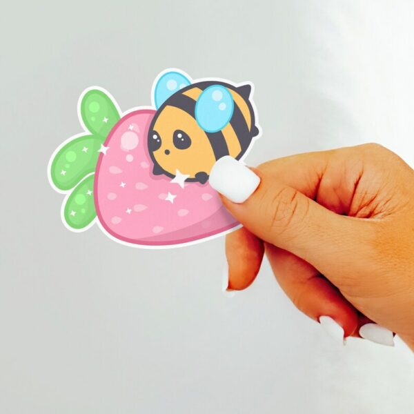 A graphic of Bumbly Bee Strawberry Friend Sticker available on HeckinMagical.com