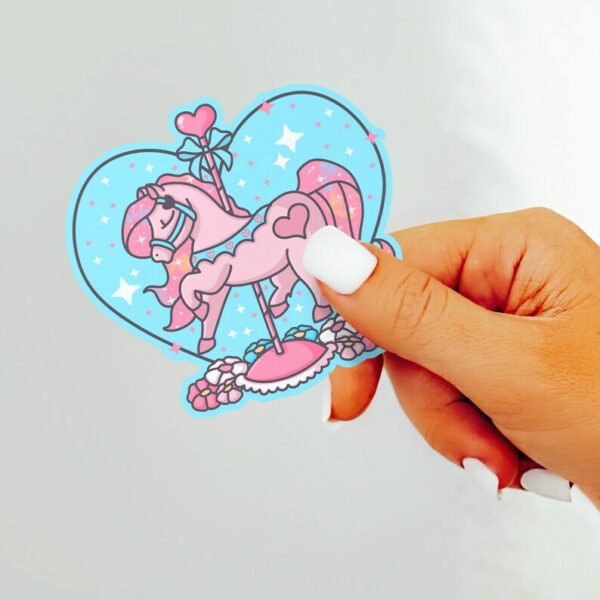 A graphic of Carousel Horse Twinkle Heart Sticker available on HeckinMagical.com