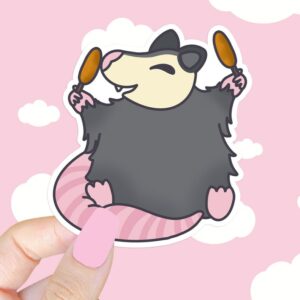 A graphic of Corn Dog Possum Sticker available on HeckinMagical.com