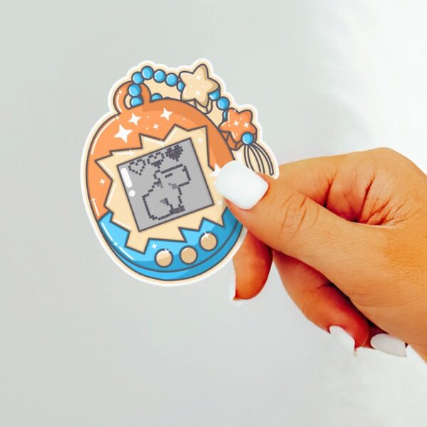 A graphic of Gamer Girl Handheld Pet Capybara Sticker available on HeckinMagical.com