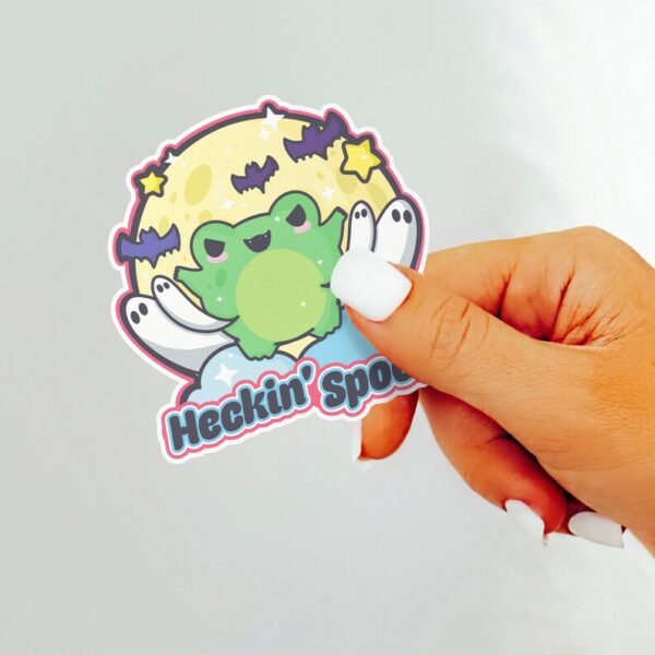 A graphic of Heckin Spooky Frog Sticker available on HeckinMagical.com