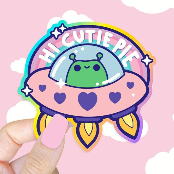 A graphic of Hi Cutie Pie Alien Sticker available on HeckinMagical.com