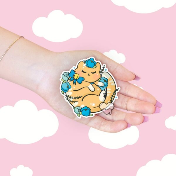 A graphic of Kawaii Floral Tabby Cat Sticker available on HeckinMagical.com