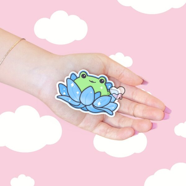 A graphic of Lotus Frog Blue Sticker available on HeckinMagical.com