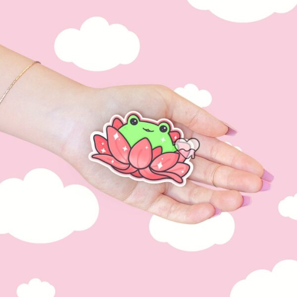 A graphic of Lotus Frog Pink Sticker available on HeckinMagical.com