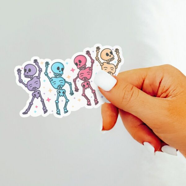 A graphic of Pastel Skeleton Dance Party Sticker available on HeckinMagical.com